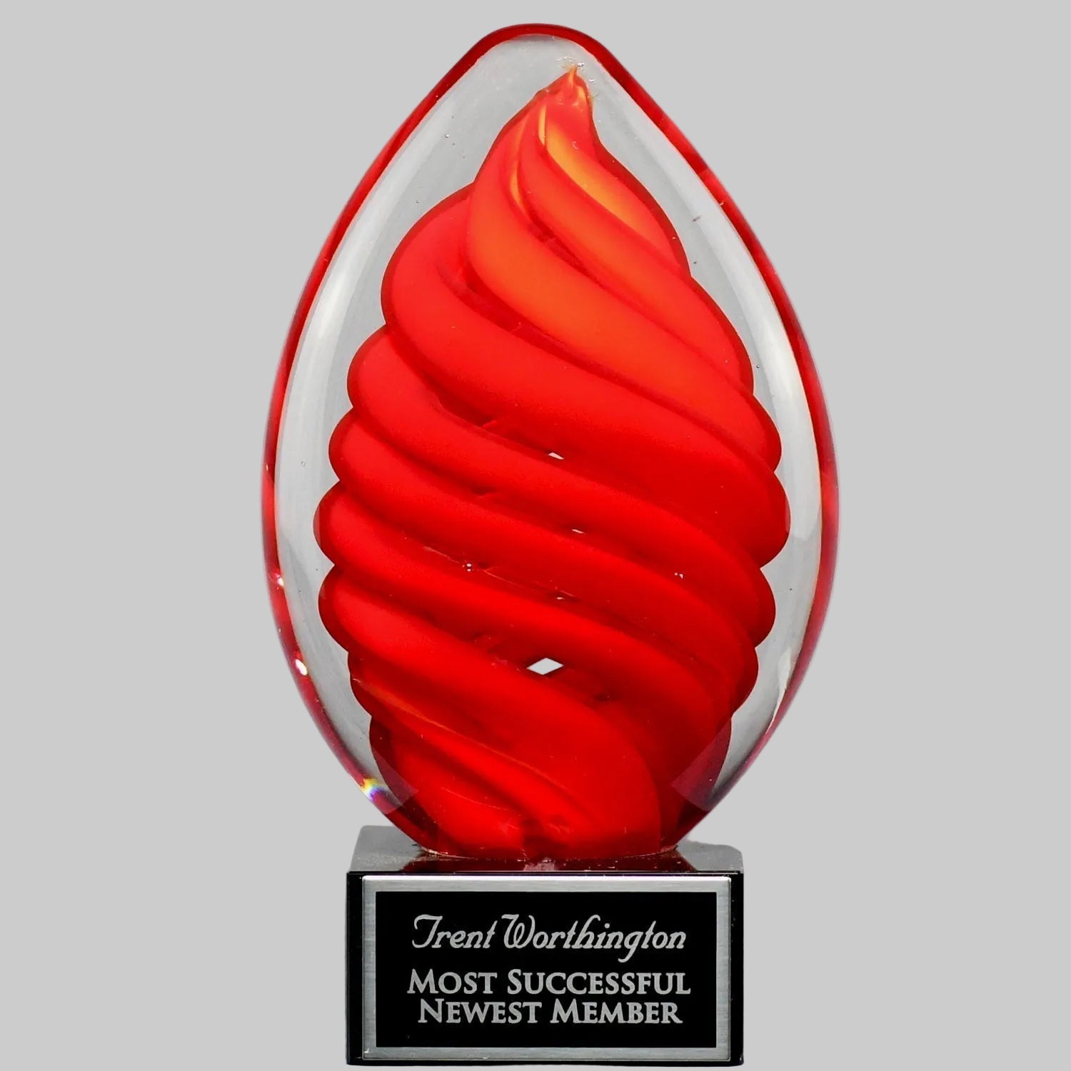 Red Swirl Egg on Black Glass Base