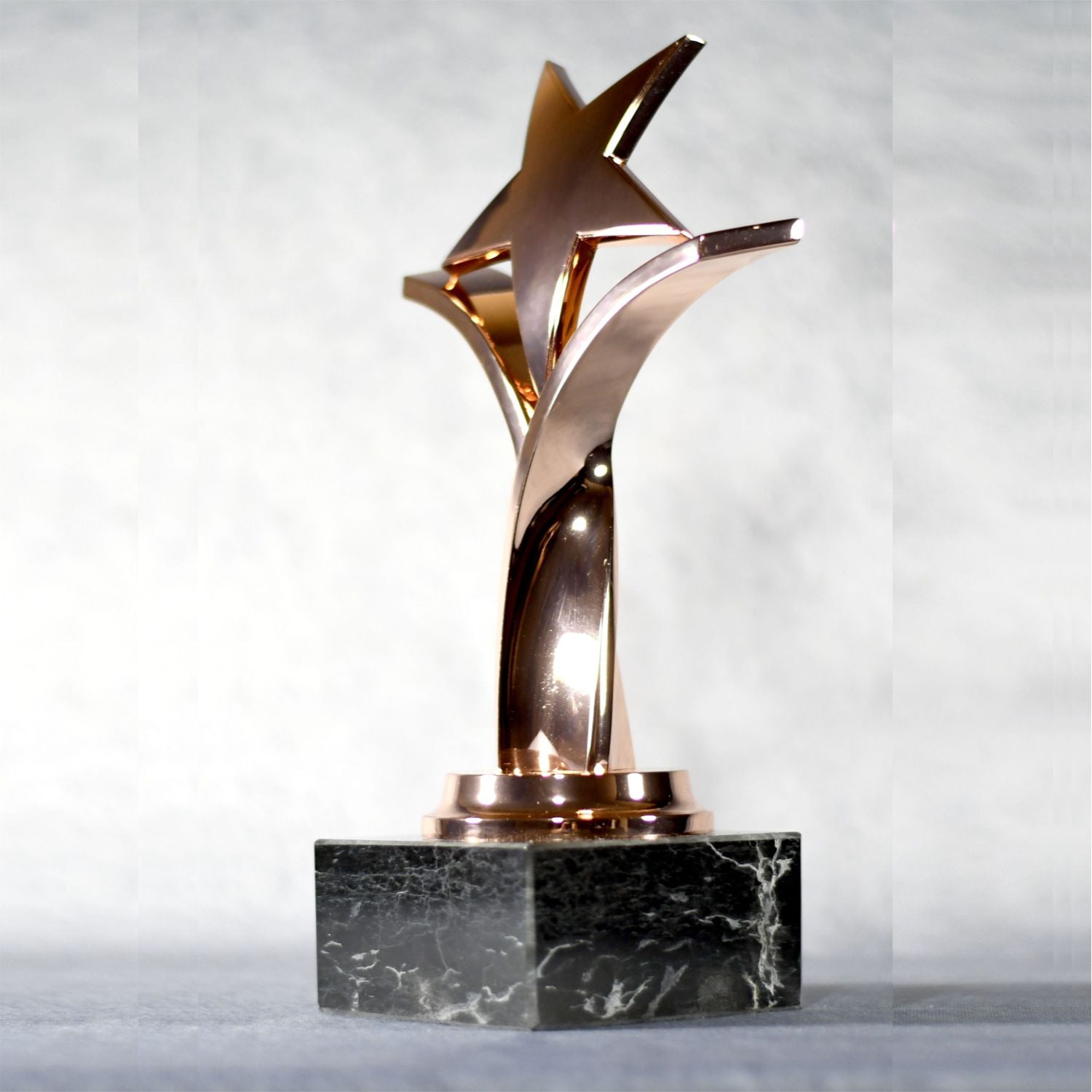 Twisting Star On Black Marble Base, Gold, Silver, Bronze | Alliance Awards LLC.