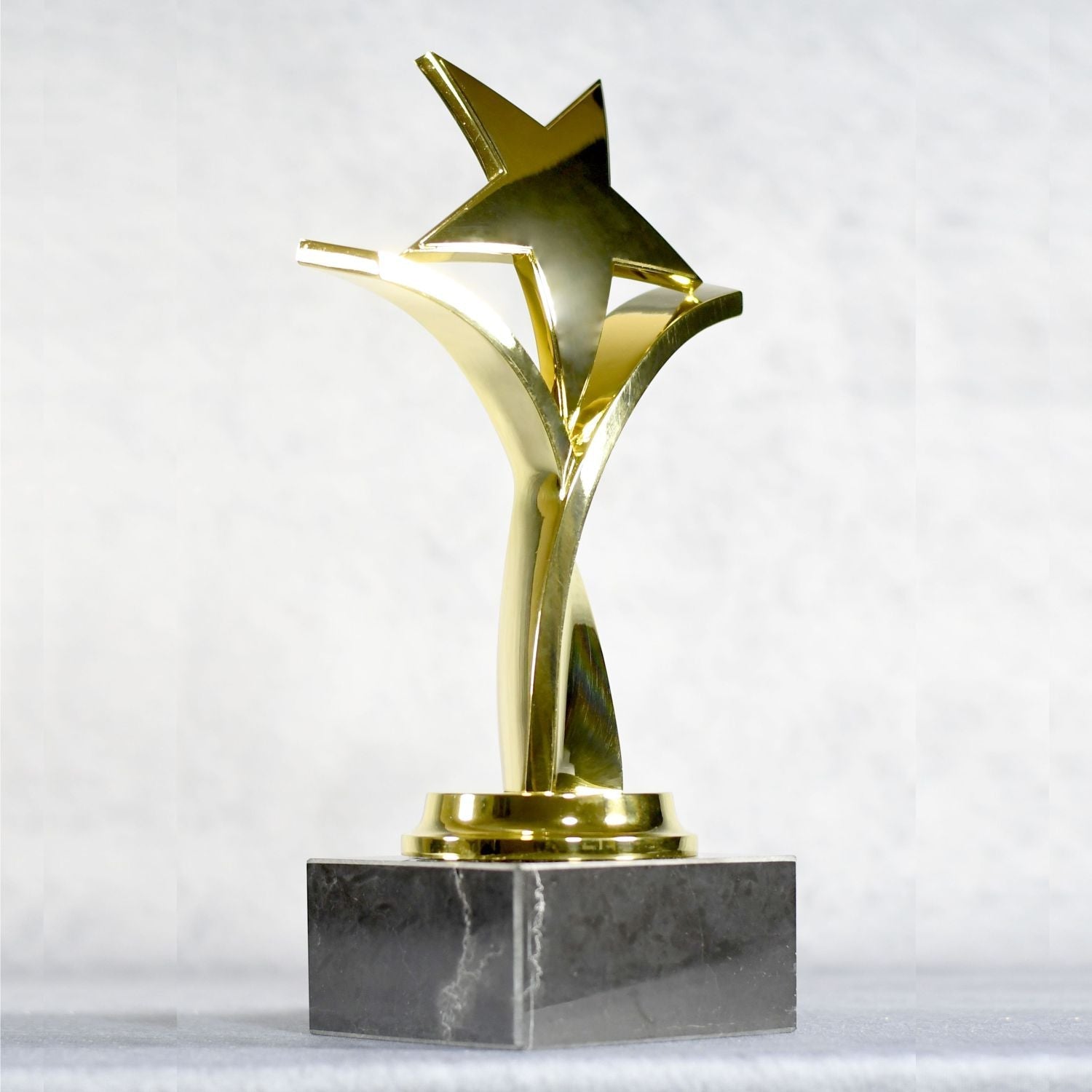 Twisting Star On Black Marble Base, Gold, Silver, Bronze | Alliance Awards LLC.