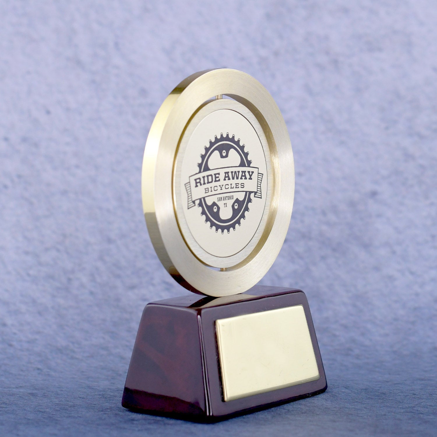 Gold Spinning Medal On Rosewood Base | Alliance Awards LLC.