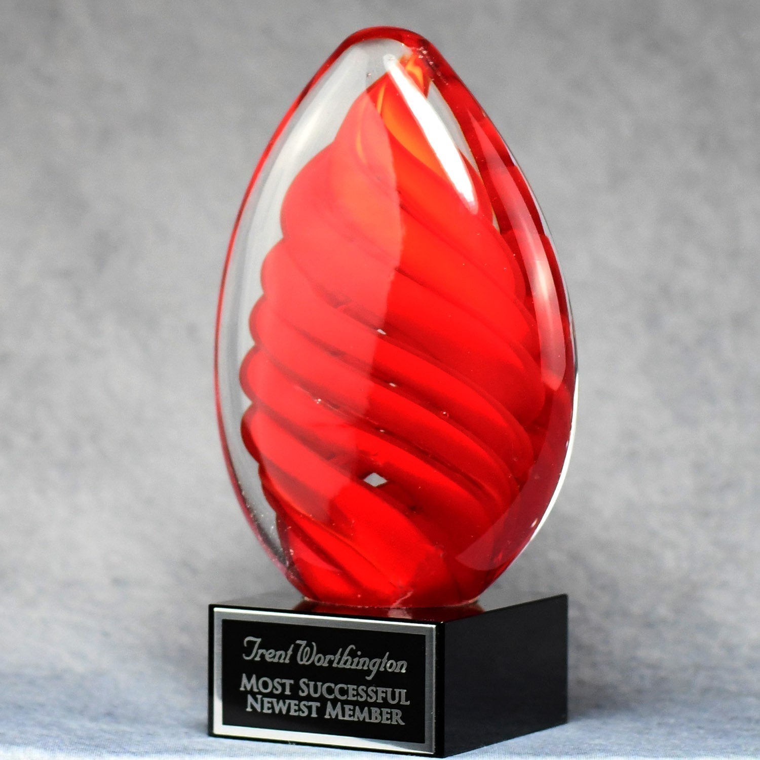 Red Swirl Egg On Black Glass Base | Alliance Awards LLC.