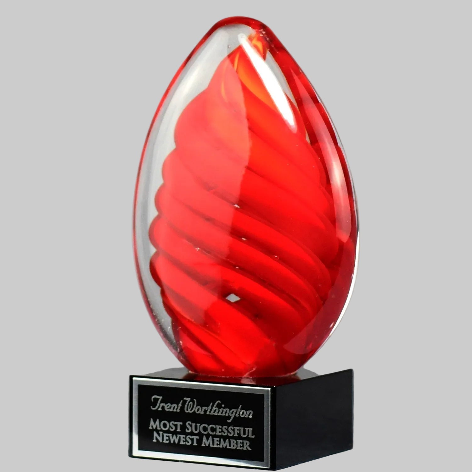 Red Swirl Egg on Black Glass Base