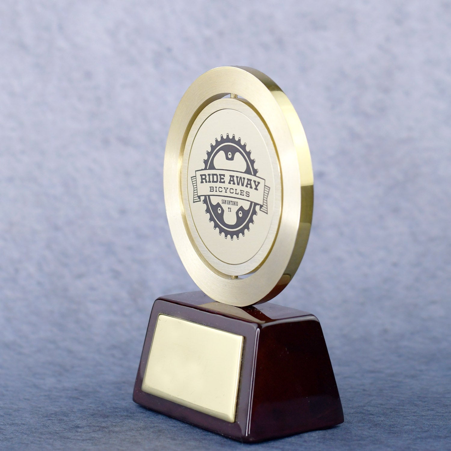 Gold Spinning Medal On Rosewood Base | Alliance Awards LLC.