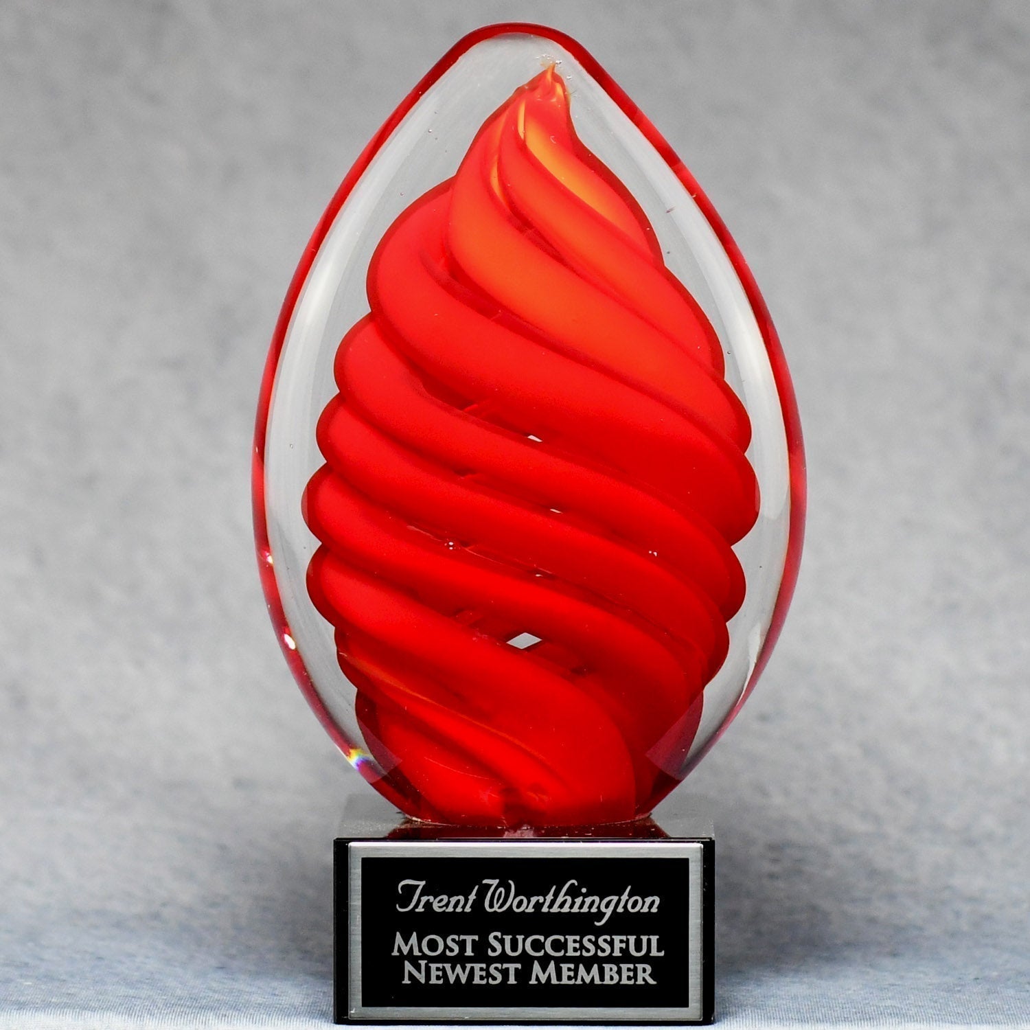 Red Swirl Egg On Black Glass Base | Alliance Awards LLC.