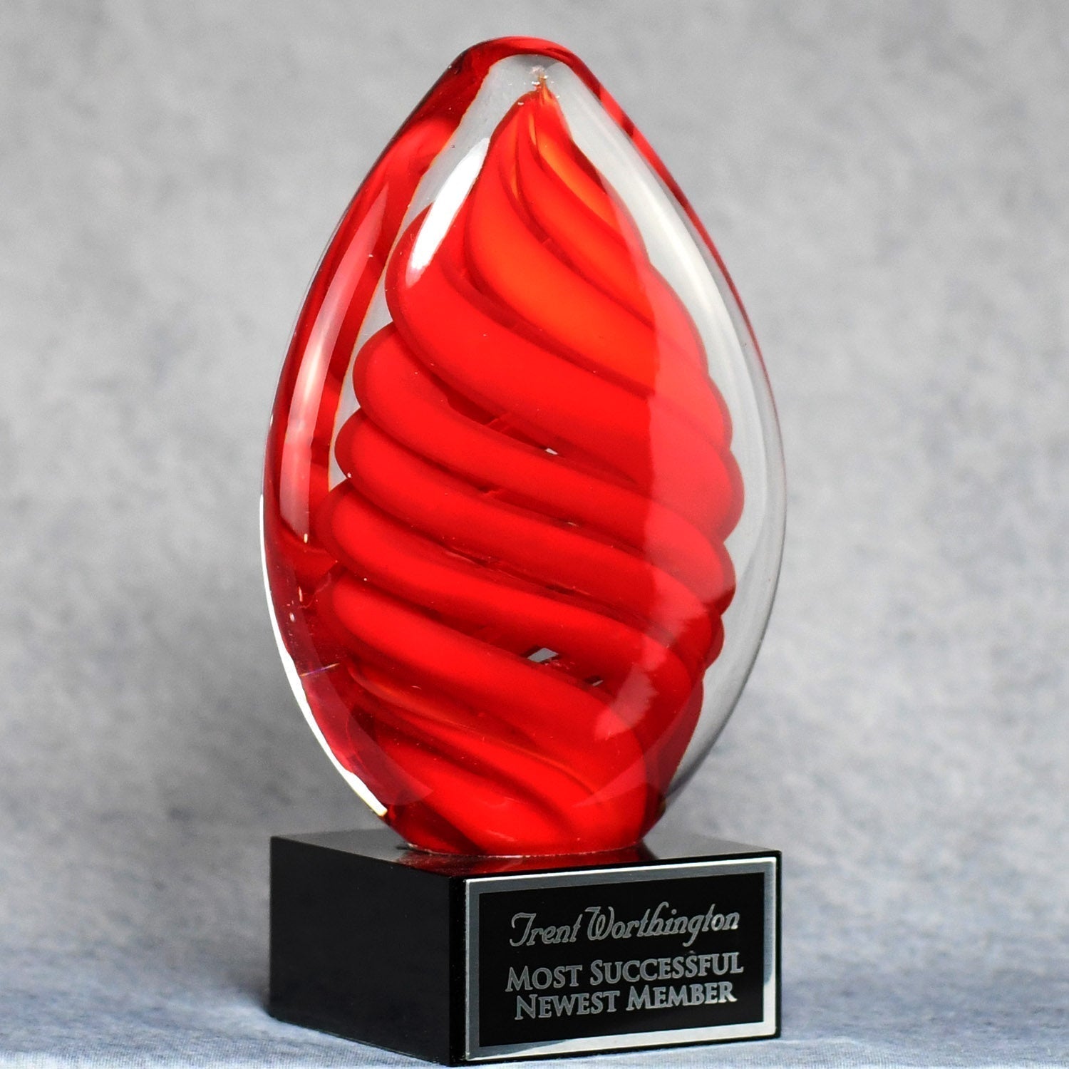 Red Swirl Egg On Black Glass Base | Alliance Awards LLC.